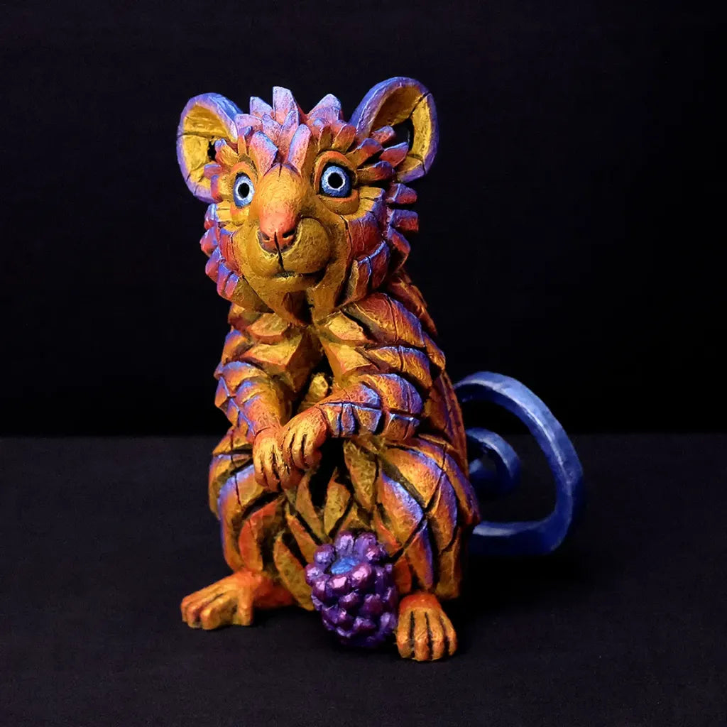 Colourful fantasy creature field mouse on a black background