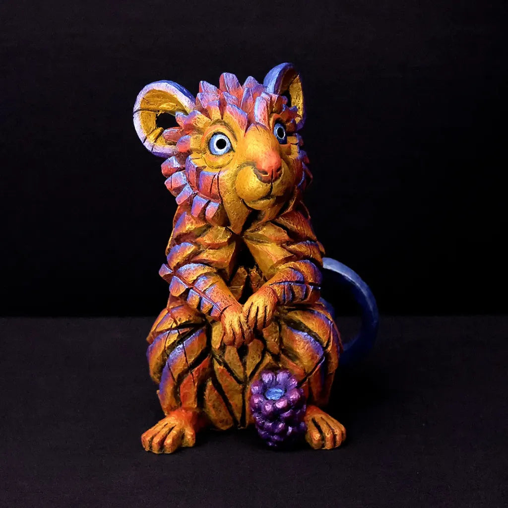 Colourful fantasy creature field mouse on a black background