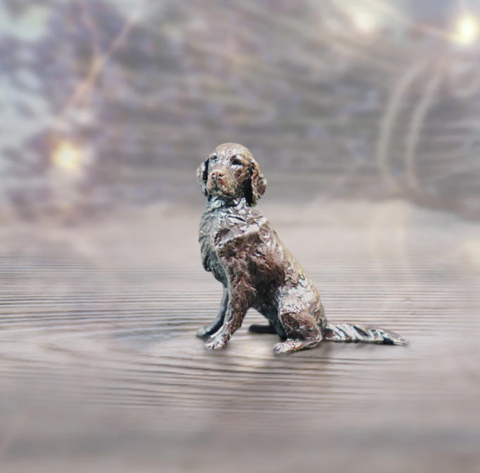 Retriever Sitting by Butler and Peach