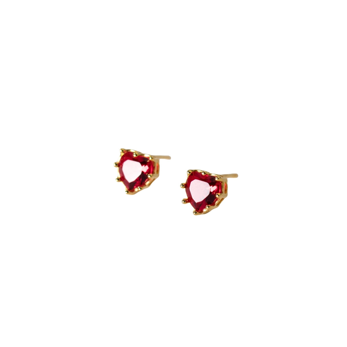 Heart-shaped red gemstone earrings with gold accents on a white background