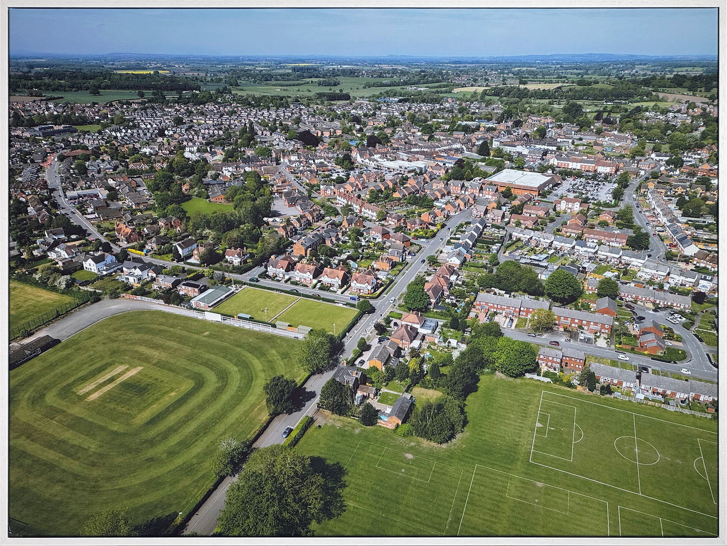 Audley Avenue aerial print by Chris Gradwell in a white frame