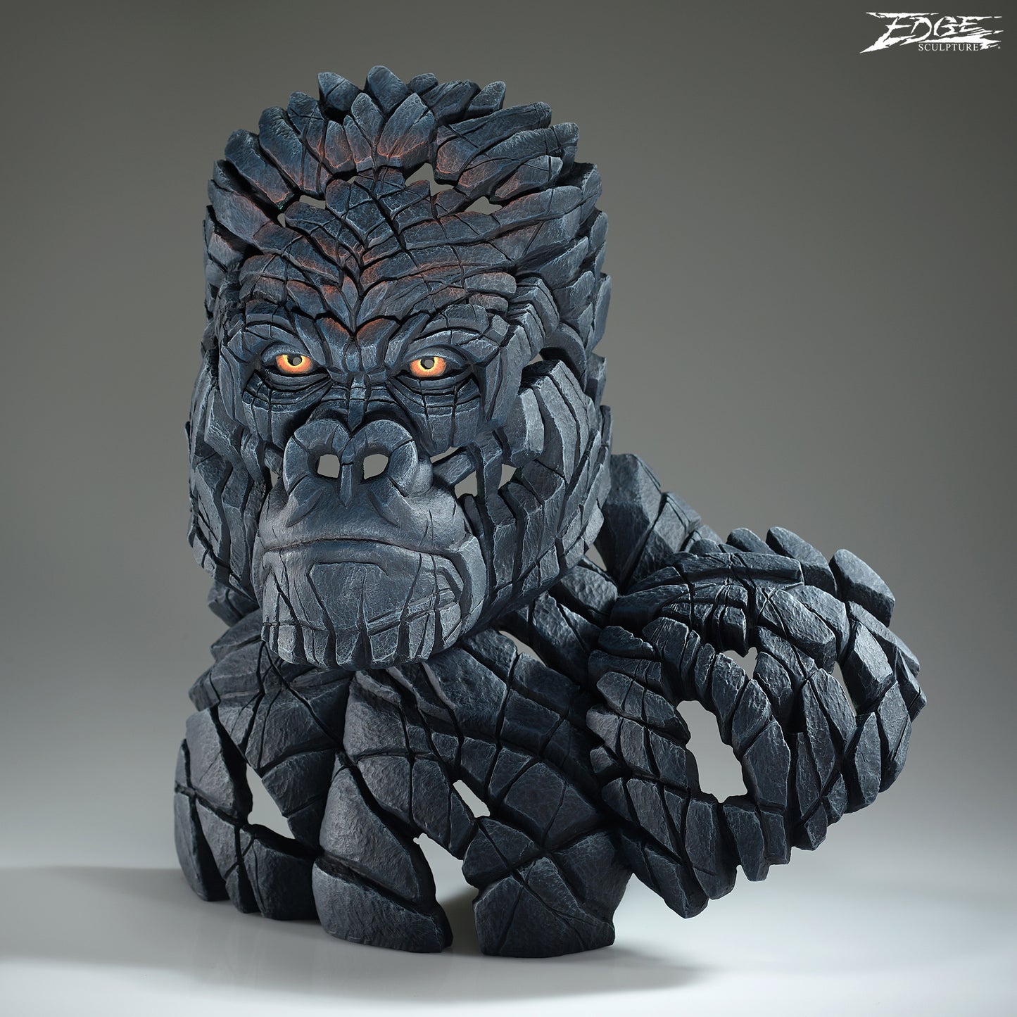 Detailed sculpture of a Mountain Gorilla on a grey background