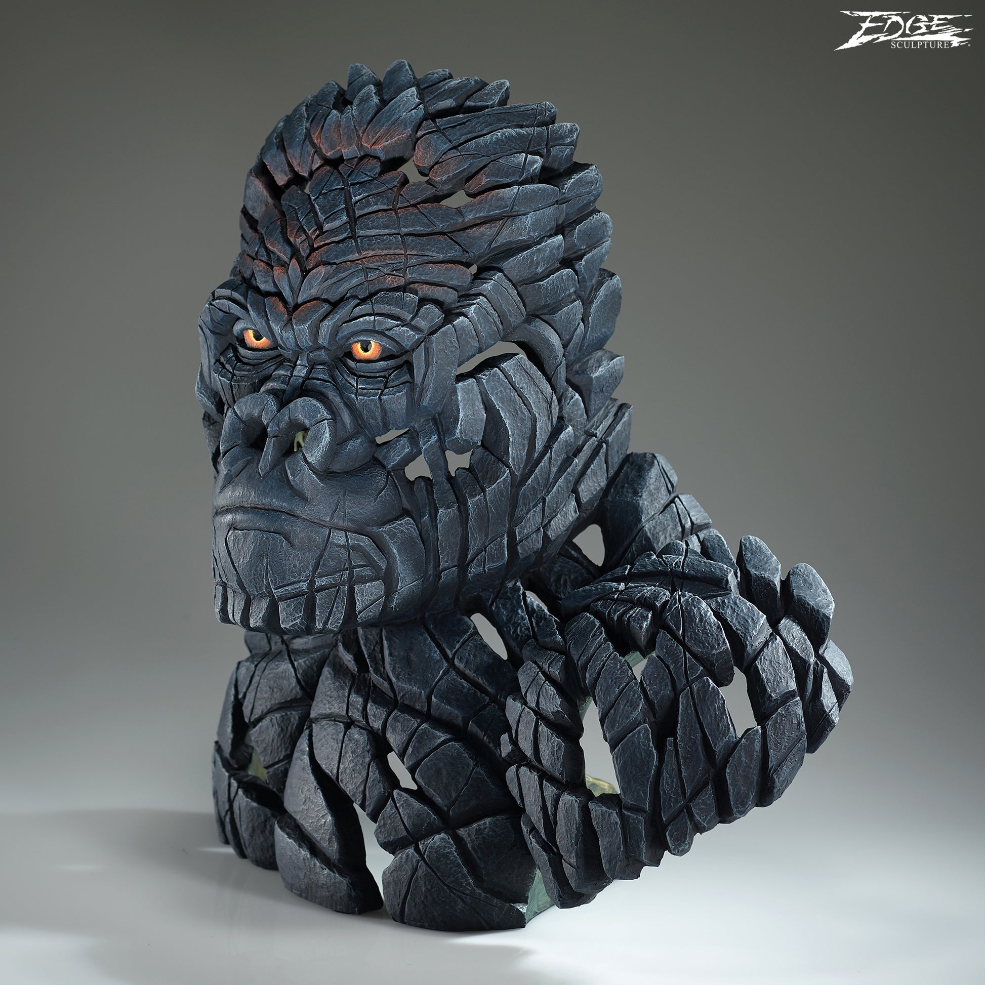 Detailed sculpture of a Mountain Gorilla on a grey background