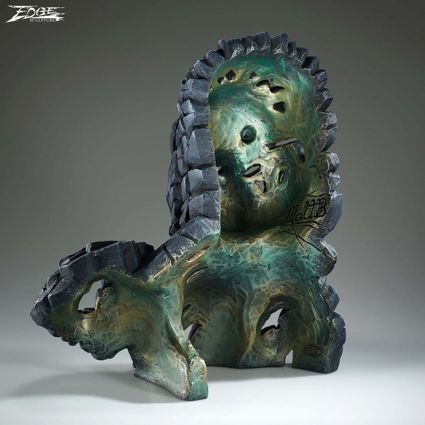 Detailed sculpture of a Mountain Gorilla on a grey background