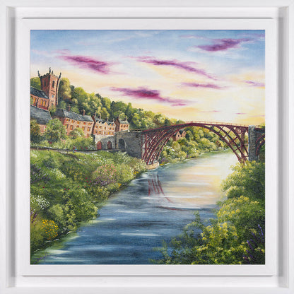 Painting of a scenic landscape of Ironbridge with a river, bridge, and buildings.