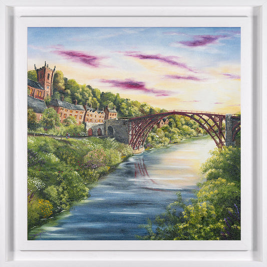 Painting of a scenic landscape of Ironbridge with a river, bridge, and buildings.