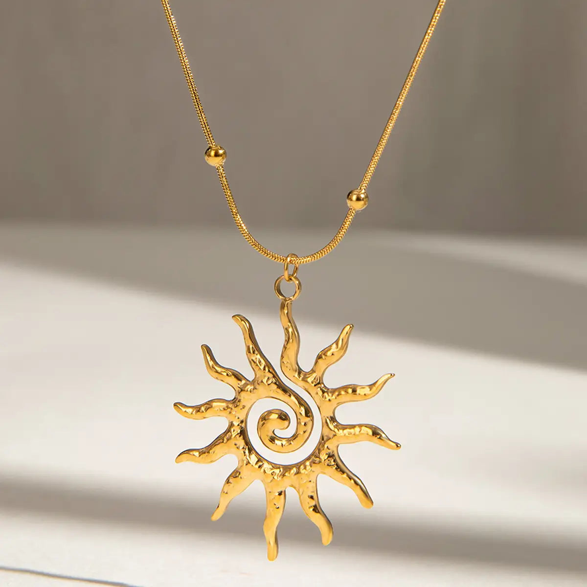 Spiral Sun Necklace Gold