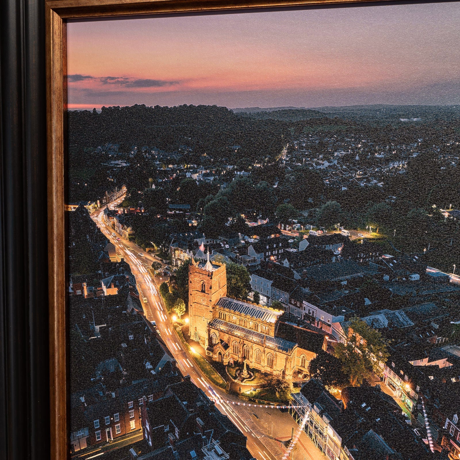 St Nicholas church Newport, sunset, drone photo framed in black and gold