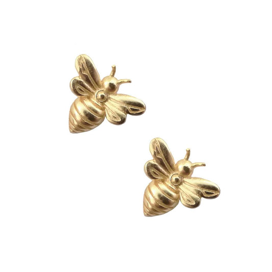 Gold bee-shaped earrings on a white background