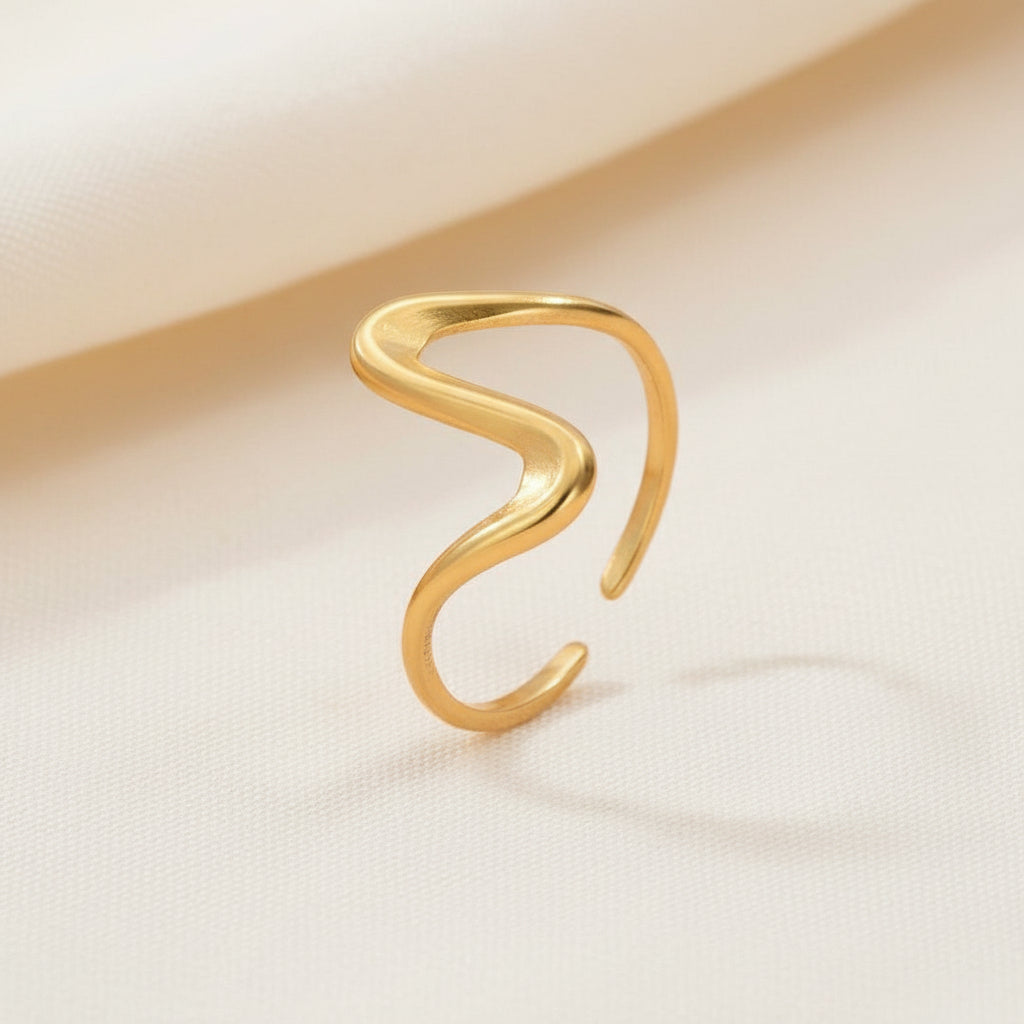 Gold ring on a white background