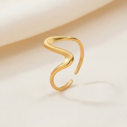 Gold ring on a white background