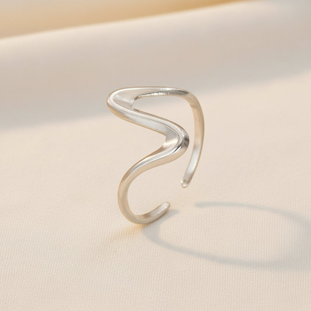 Silver ring on a white background